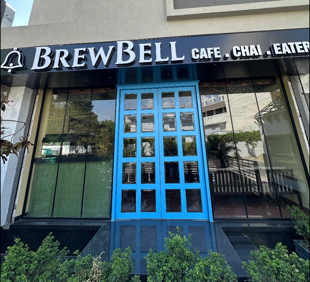 BrewBell Cafe blue-doored storefront in Ludhiana